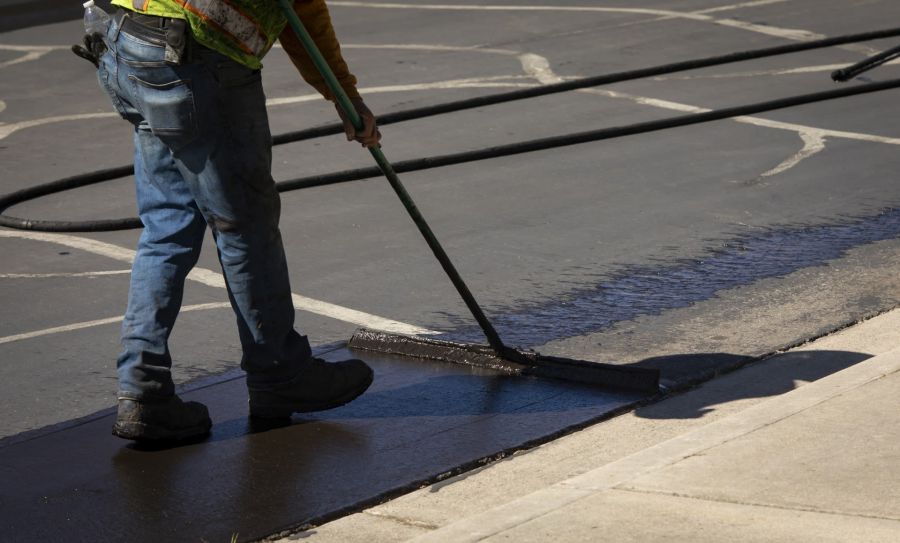 Asphalt sealcoating by Chip Seal Pros LLC